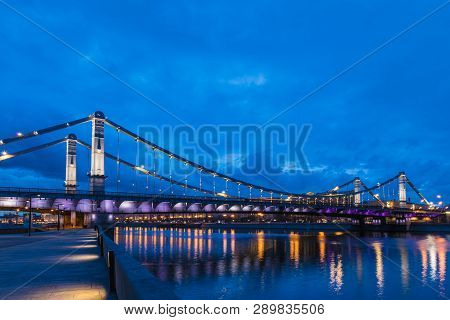 Krymsky Bridge Or Crimean Bridge  Across The Moskva River In Moscow In The Rays Of Setting Sun In Th