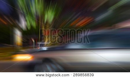 The Gray Sedan That Drives Quickly Makes The Image Become Blurred.