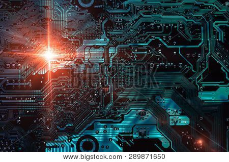Circuit Board Double Exposure Background Of Computer Motherboard With Light Flash Lens Flare.