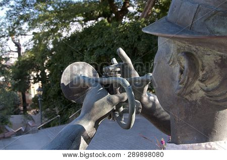 Rear Close Up Picture Of A Trumpet Player Statue In The Kitano District In Kobe, Japan