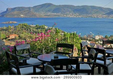 Cafe With A Beautiful View Of The Big Blue Sea And Mountains