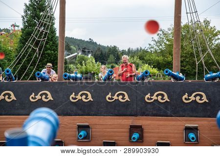 Loifling, Germany - 26 July, 2018: People Are Having Fun Shooting From Toy Cannons. Pirates Of The C