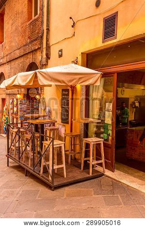Siena, Italy - October 25, 2018: Landmark Of Tuscany Siena Medeival Town, Street View And Osteria