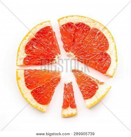 Grapefruit Slice Forming A Diagramm Top View On White Background