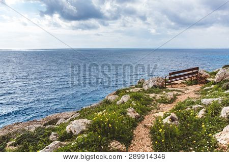 Bench Stands On The Seashore. Beautiful Valley By The Sea. Seascape In Cyprus Ayia Napa