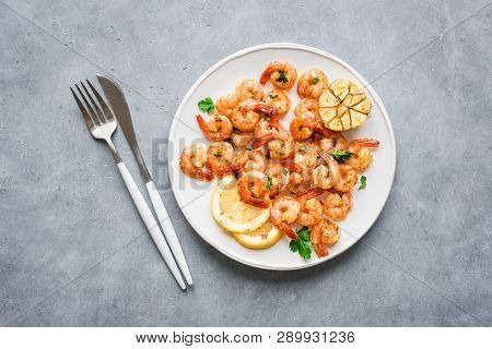 Roasted Shrimps With Lemon, Garlic And Herbs. Seafood, Shelfish. Shrimps Prawns Sauteed With Spices,