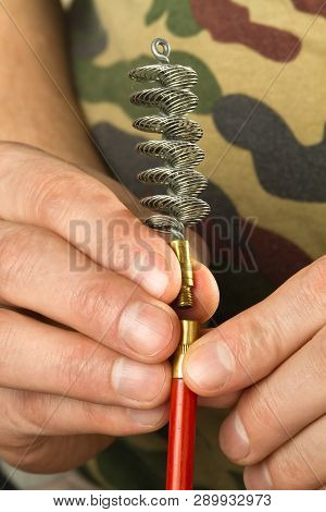 Hands Of Hunter Attach The Tornado Brush To The Ramrod, Closeup