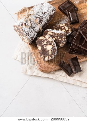 Traditional Chocolate Sausage Salami With Cocoa And Chocolate On White Background, Copy Soace, Top V