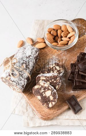 Traditional Chocolate Sausage Salami With Cocoa And Chocolate On White Background, Copy Soace, Top V