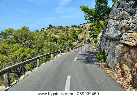 Open Coastal Road Winding Through To Lighthouse Cap Formentor