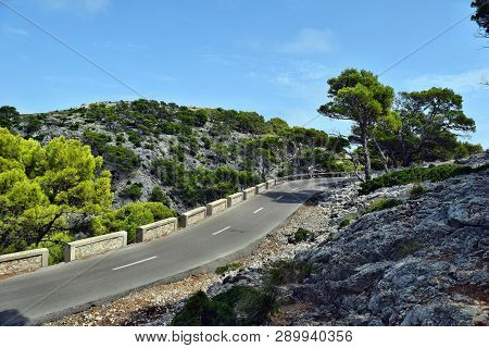 Open Coastal Road Winding Through To Lighthouse Cap Formentor