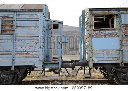 Abandoned Old Railway Wagons At Station, Old Train Wagons In An Abandoned Station