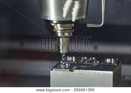 The  Cnc Milling Machine Cutting The Mould Part With The Solid Radius End Mill Tool.the Hi-technolog