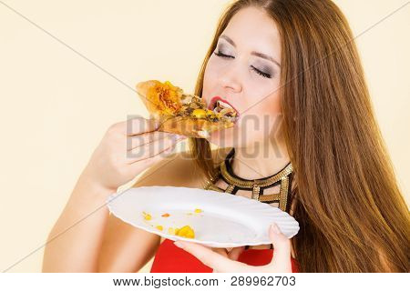 Young Woman Eating Hot Fresh Pizza Slice. Delicious Fast Food Meal. People, Italian Cuisine Concept.