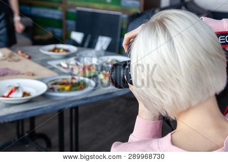 Russia Kemerovo 2019-03-10 Girl Photographer Taking Pictures On Professional Camera Canon 5D Mark Iv