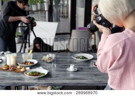 Russia Kemerovo 2019-03-10 Girl Photographer Taking Pictures On Professional Camera Canon 5D Mark Iv