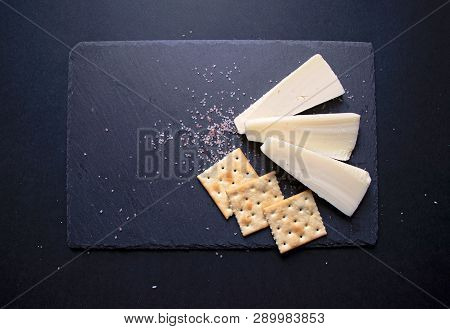 Kasseri Greek Cheese With Crackers And Salt.
