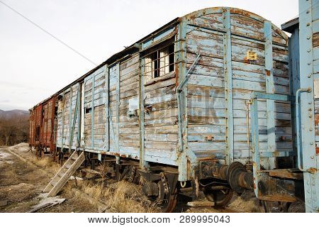 Abandoned Old Railway Wagons At Station, Old Train Wagons In An Abandoned Station