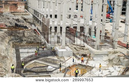 Sibiu, Romania - March 16, 2019. Workers At Steel Reinforcement For The Mall Festival Centrum Buildi