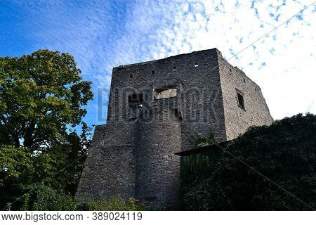 Picture Ruins Of A Medieval Castle With A Background Of Summer Sky With Fine Clouds, Hukvaldy, Czech
