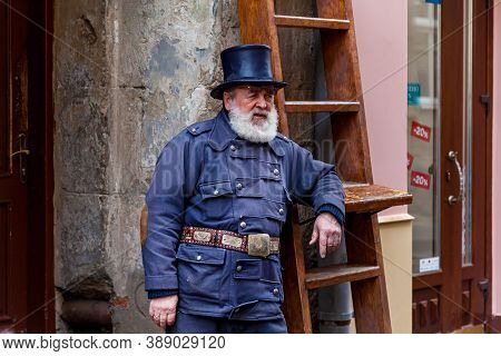 Lviv Ukraine December 21, 2019: Male Chimney Sweep Of The House Of Legends In Lvov, Ukraine. Lviv Is