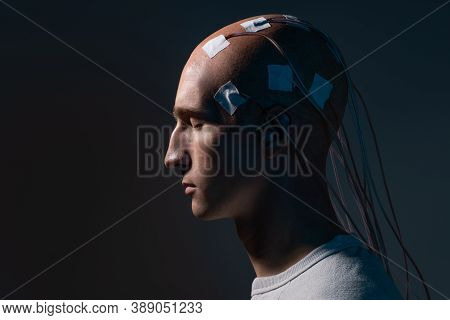 Neurointerface, Brain - Computer Communication. Cyberpunk Concept Of A Futuristic Person Connected T