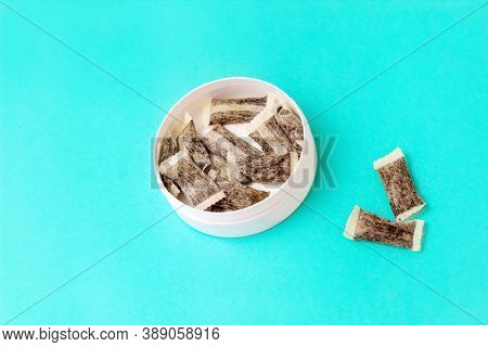 Round Box With Snus. Cigarette Substitute, Nicotine Pouches.