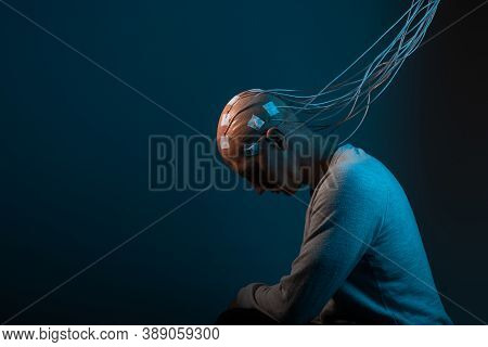 Neurointerface, Brain - Computer Communication. Cyberpunk Concept Of A Futuristic Person Connected T