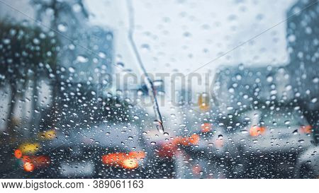 Driving Car On Road In The Rain With Raindrop Over The Wind Shield, Traffic Jam In Rainy Season