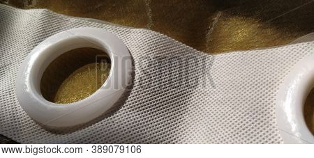 Plastic Rings For Attaching The Fabric To The Curtain Rod. White Plastic Organza Tulle Eyelets. Ligh