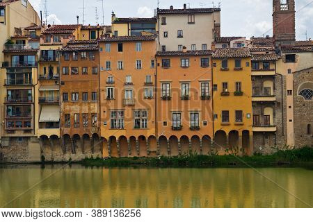 Flornce, Italy - April 24, 2019: View Of The Historic Buildings In Florence. Reflection In The River