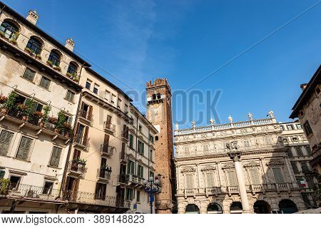 Verona, Piazza Delle Erbe. Ancient Maffei Palace In Baroque Style 1626-1663, Medieval Gardello Tower