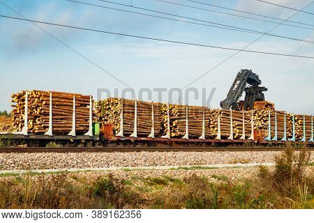 Kouvola, Finland - 24 September 2020: Unloading Of Timber From Railway Carriages At Paper Mill Stora