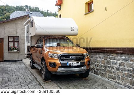 Odry, Czech Republic - October 7, 2020: Ford Ranger Pickup In A Caravan Version Parked Near The Hous