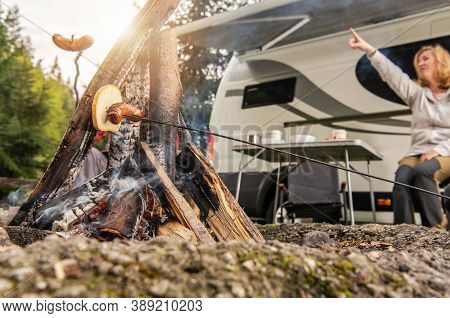 Summer Outdoor Destinations. Recreational Vehicle Rv Camper Camping Pitch Campfire. Caucasian Woman 