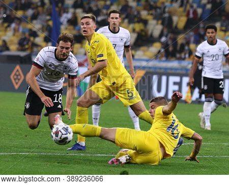 Kyiv, Ukraine - October 10, 2020: Leon Goretzka Of Germany (l) Fights For A Ball With Vitaliy Mykole