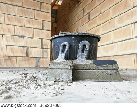 Taping Knifes And Cement Bucket(construction Work Tools) For Constructions At Construction Site