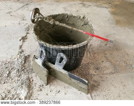 Taping Knifes And Cement Bucket(construction Work Tools) For Constructions At Construction Site