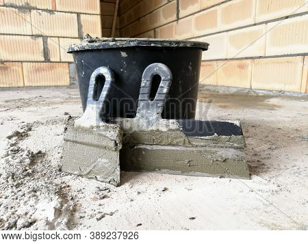 Taping Knifes And Cement Bucket(construction Work Tools) For Constructions At Construction Site