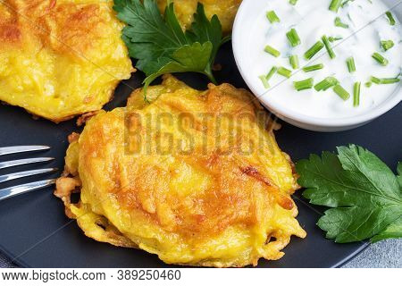 Fried Cakes Of Grated Potatoes On The Plate With Sauce. Traditional Pancakes Boxty Raggmunk.