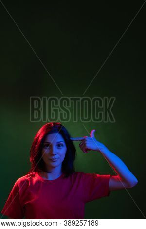 Female Night Portrait. Mind Blown. Stress Anxiety. Mental Disorder. Insane Woman Pointing Finger At 
