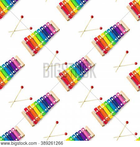Seamless Pattern Of Rainbow Colored Wooden Toy 8 Tone Xylophone Glockenspiel Isolated On White Backg