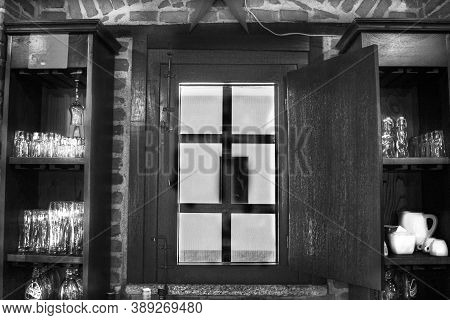 Window Of A Pub Photographed Taken Against The Light
