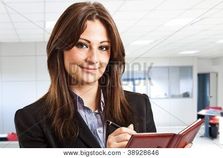 Portrait of a young smiling businesswoman