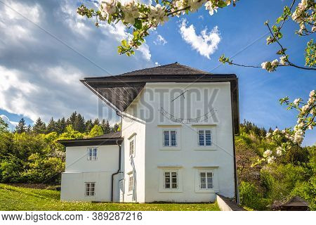 Historic Building With Sundial In The Spania Dolina Village, Slovakia, Europe.