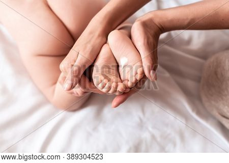 Hygiene - Young Mom Wiping The Baby Skin Body With Wet Wipes Carefully. Mother Changing The Baby Nap