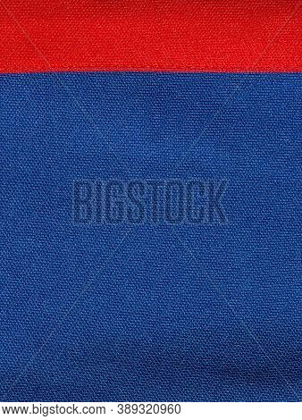 The Two-colour Texture Of The Synthetic Fabric Is Blue And Red. Nylon Texture. Embossed Synthetic Fi