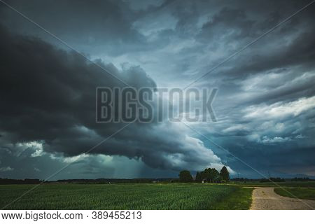 Supercell Storm Clouds With Wall Cloud And Intense Rain