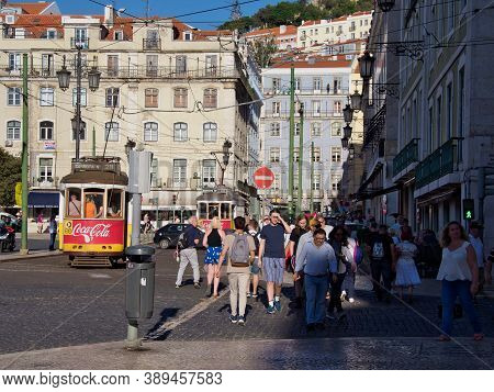 Lisbon, Portugal - October 01, 2019:  People Walking Along The Rua Dos Douradores Or Gilders' Street