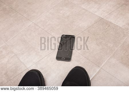 The Black Smartphone Fell Out Of My Hands And The Screen Crashed To Smithereens.